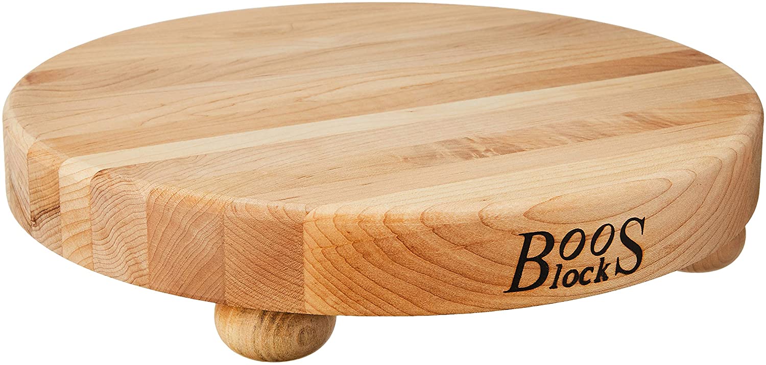 Price:$60.95 Boos Block B12R Round Maple Wood Edge Grain Cutting Board with Feet, 12 Inches Round, 1.5 Inches Thick