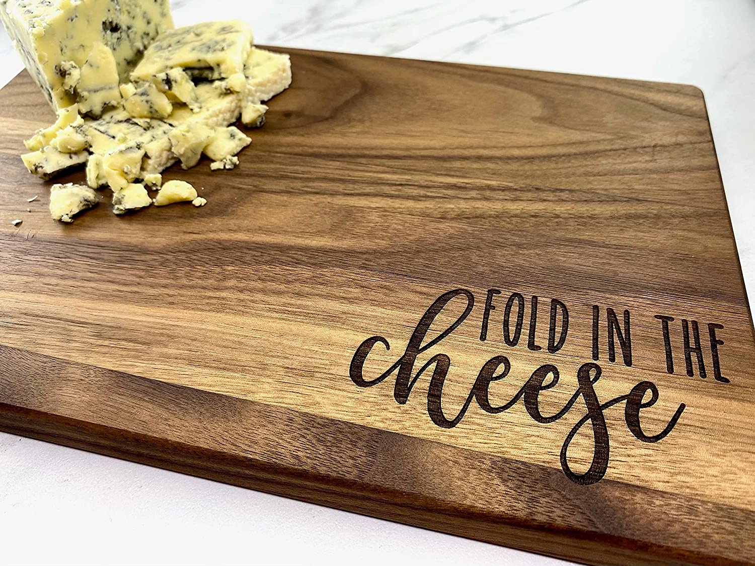 Price:$42.99 Fold in the Cheese. Laser Engraved Walnut Cutting Board with Juice Groove. 12x8x .75. Gift for Housewarming, Birthday, Mothers Day, or any Special Occasion.: Home & Kitchen