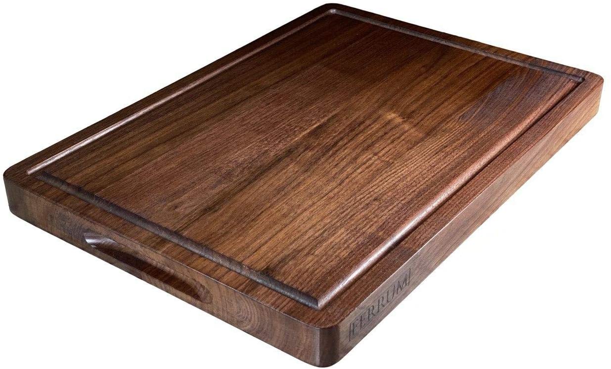 Price:$57.95 Cutting Board Black Walnut 17x12x1.25 Inches Reversible with Handles and Juice Groove, Extra Thick Butcher Block Chopping Board Handmade By Ferrum.: Home & Kitchen