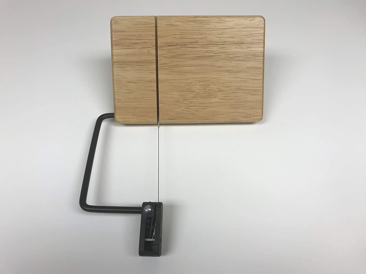 Price:$17.99 Beechwood Cheese Slicer, 7" x 4 3/4", Brown: Manual Cheese Slicers: Home & Kitchen